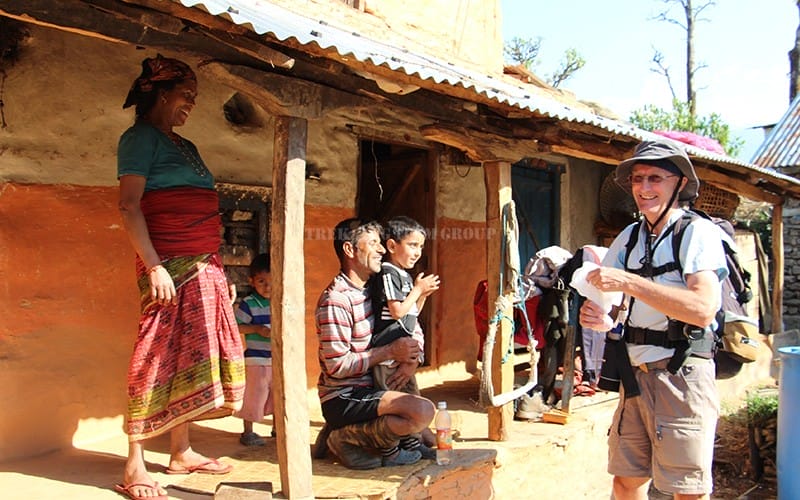 trekkers talking to people in the local community of Nepal
